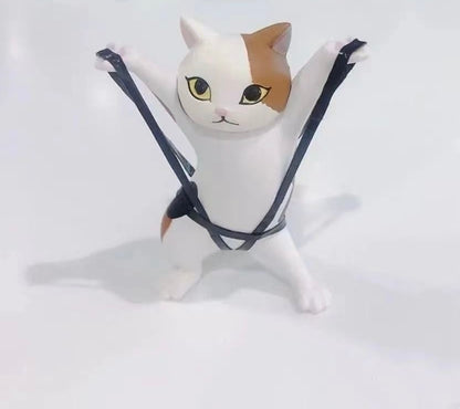 踊る猫の置物